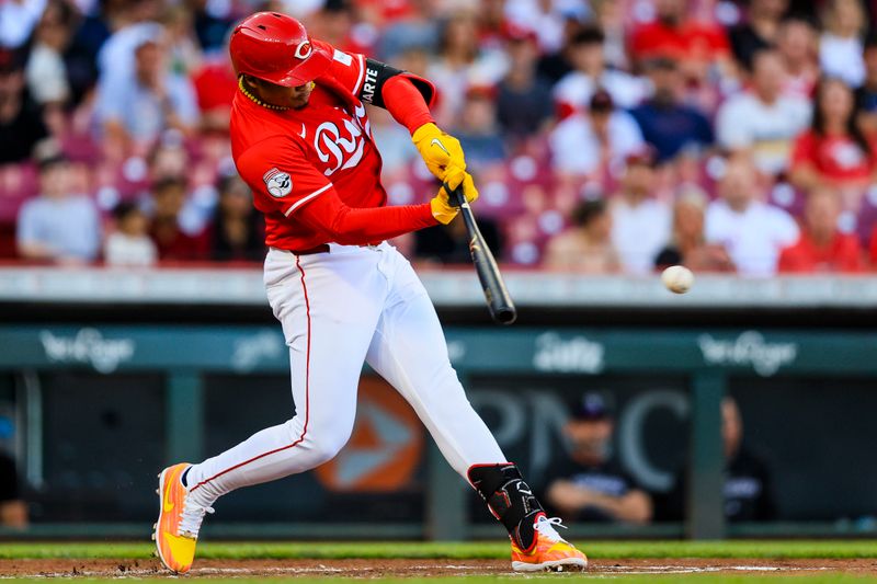 Jul 10, 2024; Cincinnati, Ohio, USA; Cincinnati Reds third baseman Noelvi Marte (16) hits a single against the Colorado Rockies in the second inning at Great American Ball Park. Mandatory Credit: Katie Stratman-USA TODAY Sports