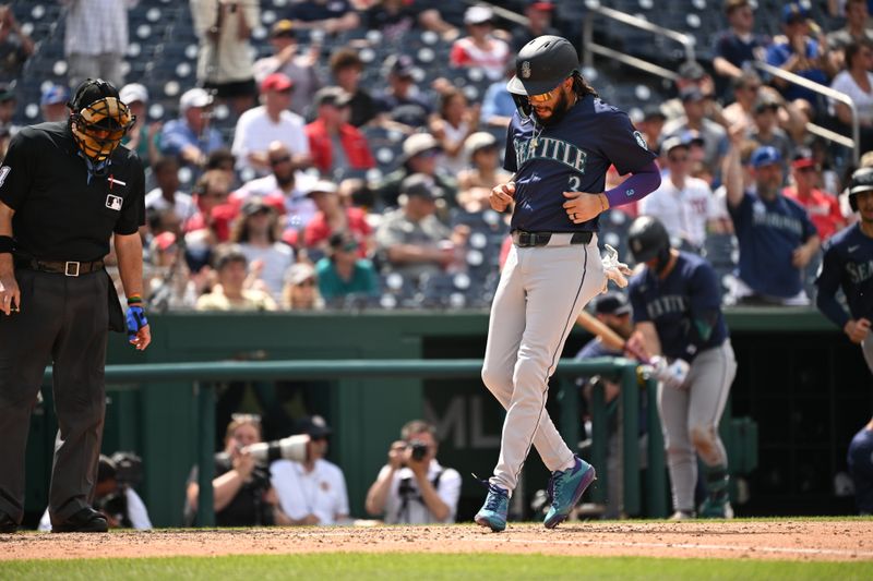 May 26, 2024; Washington, District of Columbia, USA; Seattle Mariners shortstop J.P. Crawford (3) crosses home plate for a run against the Washington Nationals during the eighth inning at Nationals Park. Mandatory Credit: Rafael Suanes-USA TODAY Sports