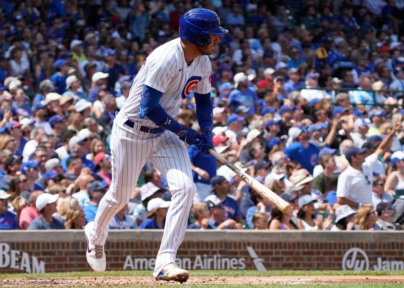 Aug 19, 2023; Chicago, Illinois, USA; Chicago Cubs center fielder Cody Bellinger (24) hits a two-run home run against the Kansas City Royals during the first inning at Wrigley Field. Mandatory Credit: David Banks-USA TODAY Sports