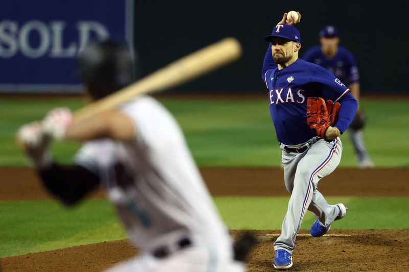 Nov 1, 2023; Phoenix, Arizona, USA; Texas Rangers starting pitcher Nathan Eovaldi (17) throws a pitch against the Arizona Diamondbacks during the sixth inning in game five of the 2023 World Series at Chase Field. Mandatory Credit: Mark J. Rebilas-USA TODAY Sports