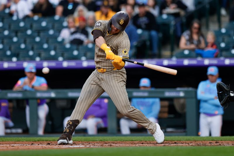 May 9, 2025; Denver, Colorado, USA; San Diego Padres designated hitter Gavin Sheets (30) hits a three RBI double in the third inning against the Colorado Rockies at Coors Field. Mandatory Credit: Isaiah J. Downing-Imagn Images
