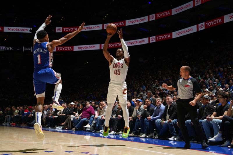 PHILADELPHIA, PA - NOVEMBER 13: Donovan Mitchell #45 of the Cleveland Cavaliers shoots a three point basket during the game against the Philadelphia 76ers on November 13, 2024 at the Wells Fargo Center in Philadelphia, Pennsylvania NOTE TO USER: User expressly acknowledges and agrees that, by downloading and/or using this Photograph, user is consenting to the terms and conditions of the Getty Images License Agreement. Mandatory Copyright Notice: Copyright 2024 NBAE (Photo by Jesse D. Garrabrant/NBAE via Getty Images)