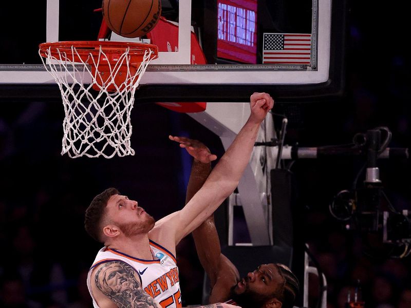 NEW YORK, NEW YORK - JANUARY 03: Isaiah Hartenstein #55 of the New York Knicks blocks a shot by Patrick Williams #44 of the Chicago Bulls during the first half at Madison Square Garden on January 03, 2024 in New York City. NOTE TO USER: User expressly acknowledges and agrees that, by downloading and or using this photograph, User is consenting to the terms and conditions of the Getty Images License Agreement. (Photo by Elsa/Getty Images)