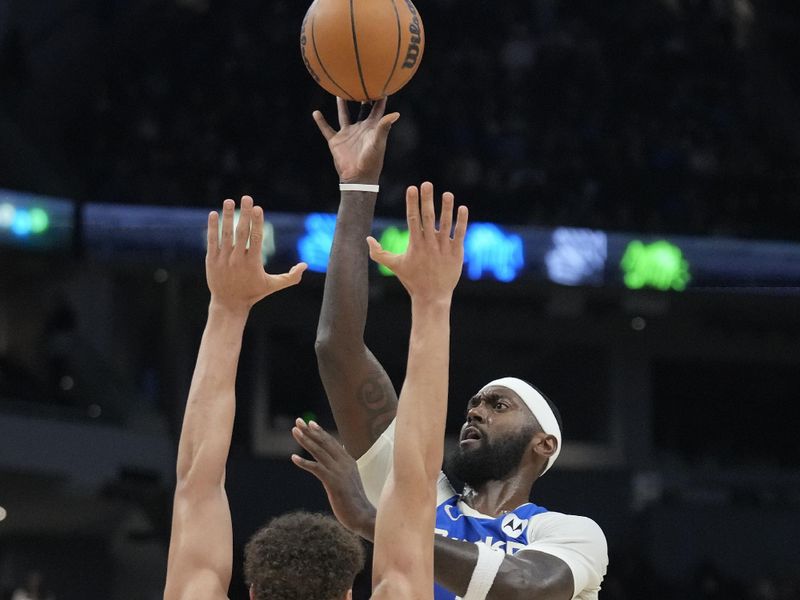 MILWAUKEE, WISCONSIN - NOVEMBER 23: Bobby Portis #9 of the Milwaukee Bucks shoots the ball against Tidjane Salaun #31 of the Charlotte Hornets during the second quarter of a a game at Fiserv Forum on November 23, 2024 in Milwaukee, Wisconsin. NOTE TO USER: User expressly acknowledges and agrees that, by downloading and or using this photograph, User is consenting to the terms and conditions of the Getty Images License Agreement. (Photo by Patrick McDermott/Getty Images)