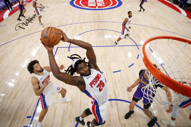 DETROIT, MI - NOVEMBER 4: Isaiah Stewart #28 of the Detroit Pistons rebounds the ball during the game against the Los Angeles Lakers on November 4, 2024 at Little Caesars Arena in Detroit, Michigan. NOTE TO USER: User expressly acknowledges and agrees that, by downloading and/or using this photograph, User is consenting to the terms and conditions of the Getty Images License Agreement. Mandatory Copyright Notice: Copyright 2024 NBAE (Photo by Brian Sevald/NBAE via Getty Images)