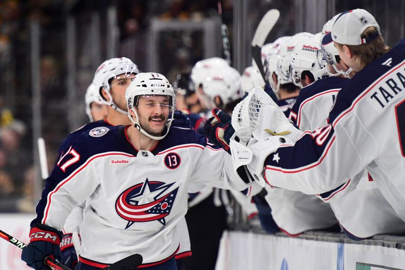 Nov 18, 2024; Boston, Massachusetts, USA;  Columbus Blue Jackets right wing Justin Danforth (17) celebrates his shorthanded goal with his teammates during the third period against the Boston Bruins at TD Garden. Mandatory Credit: Bob DeChiara-Imagn Images