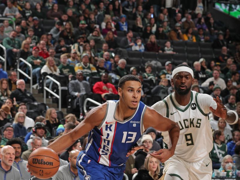 MILWAUKEE, WI - JANUARY 14: Keegan Murray #13 of the Sacramento Kings drives to the basket during the game against the Milwaukee Bucks on January 14, 2024 at the Fiserv Forum Center in Milwaukee, Wisconsin. NOTE TO USER: User expressly acknowledges and agrees that, by downloading and or using this Photograph, user is consenting to the terms and conditions of the Getty Images License Agreement. Mandatory Copyright Notice: Copyright 2024 NBAE (Photo by Gary Dineen/NBAE via Getty Images).