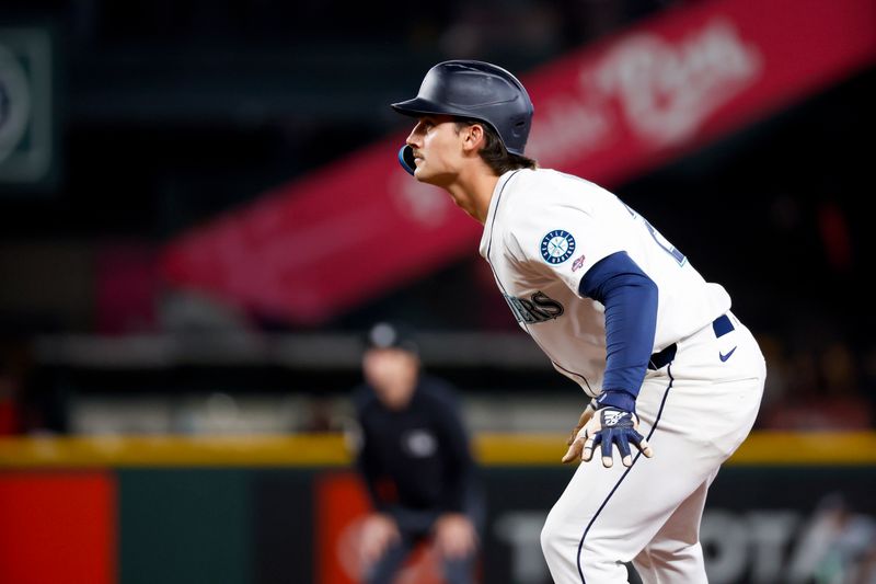 May 31, 2025; Seattle, Washington, USA; Seattle Mariners second baseman Cole Young (2) takes a lead from first base against the Minnesota Twins during the seventh inning at T-Mobile Park. Mandatory Credit: Joe Nicholson-Imagn Images
