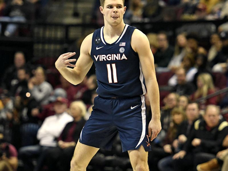 Jan 14, 2023; Tallahassee, Florida, USA; Virginia Cavaliers guard Isaac McKneely (11) celebrates a three point basket during the second half against the Florida State Seminoles at Donald L. Tucker Center. Mandatory Credit: Melina Myers-USA TODAY Sports