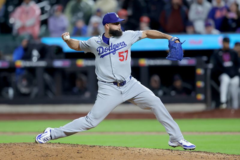May 23, 2025; New York City, New York, USA; Los Angeles Dodgers relief pitcher Luis Garcia (57) pitches against the New York Mets during the thirteenth inning at Citi Field. Mandatory Credit: Brad Penner-Imagn Images