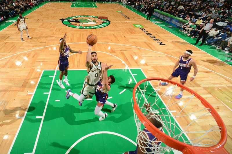 BOSTON, MA - MARCH 14: Jayson Tatum #0 of the Boston Celtics. drives to the basket during the game against the Phoenix Suns on March 14, 2024 at the TD Garden in Boston, Massachusetts. NOTE TO USER: User expressly acknowledges and agrees that, by downloading and or using this photograph, User is consenting to the terms and conditions of the Getty Images License Agreement. Mandatory Copyright Notice: Copyright 2024 NBAE  (Photo by Brian Babineau/NBAE via Getty Images)