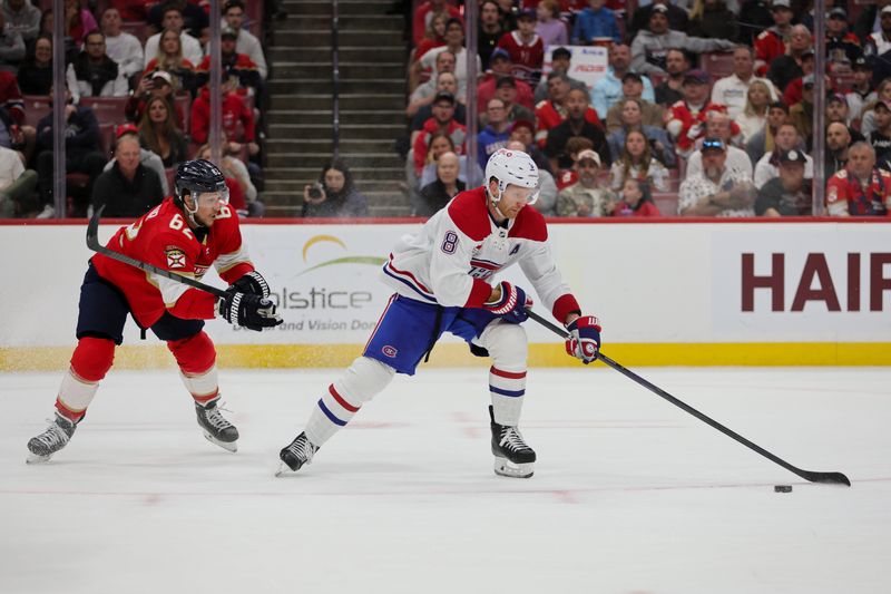 Feb 29, 2024; Sunrise, Florida, USA; Montreal Canadiens defenseman Mike Matheson (8) moves the puck past Florida Panthers defenseman Brandon Montour (62) during the first period at Amerant Bank Arena. Mandatory Credit: Sam Navarro-USA TODAY Sports