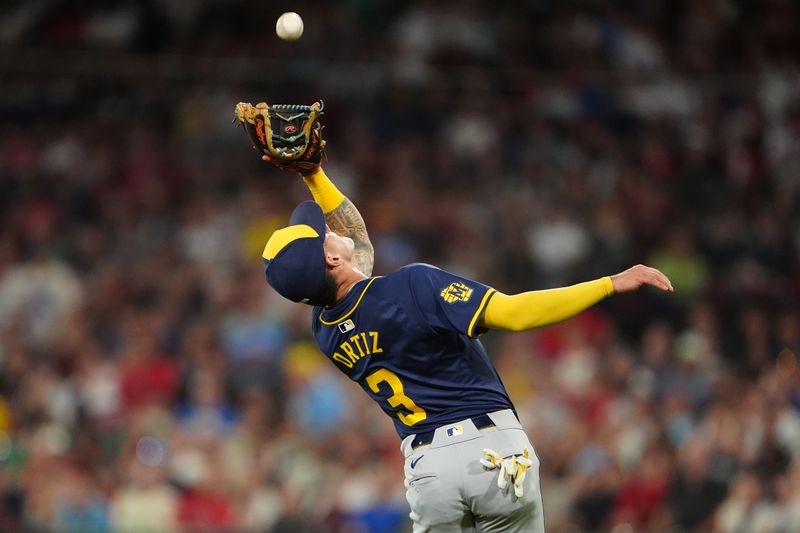 May 24, 2024; Boston, Massachusetts, USA; Milwaukee Brewers third baseman Joey Ortiz (3) catches a fly ball hit by Boston Red Sox center fielder Ceddanne Rafaela (not pictured) during the sixth inning at Fenway Park. Mandatory Credit: Gregory Fisher-USA TODAY Sports