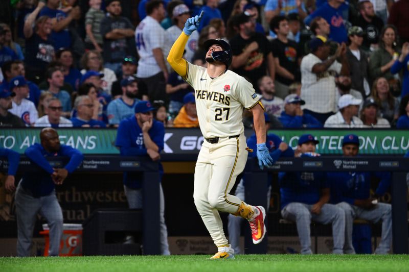 May 27, 2024; Milwaukee, Wisconsin, USA; Milwaukee Brewers shortstop Willy Adames (27) reacts after hitting a 3-run home run in the eighth inning against the Chicago Cubs at American Family Field. Mandatory Credit: Benny Sieu-USA TODAY Sports