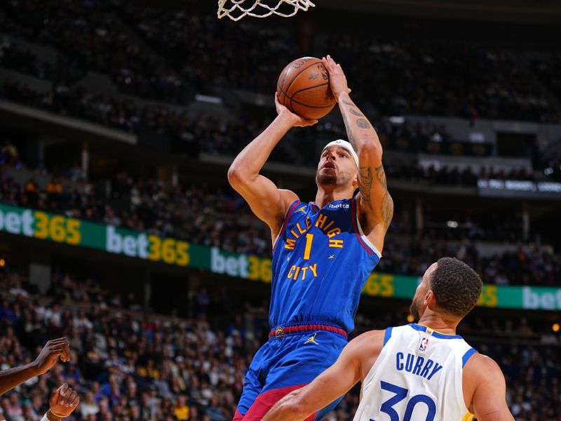 DENVER, CO - DECEMBER 3: Michael Porter Jr. #1 of the Denver Nuggets drives to the basket during the game against the Golden State Warriors during the Emirates NBA Cup on December 3, 2024 at Ball Arena in Denver, Colorado. NOTE TO USER: User expressly acknowledges and agrees that, by downloading and/or using this Photograph, user is consenting to the terms and conditions of the Getty Images License Agreement. Mandatory Copyright Notice: Copyright 2024 NBAE (Photo by Garrett Ellwood/NBAE via Getty Images)