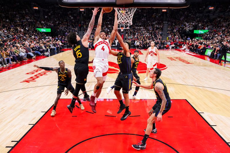 TORONTO, CANADA - JANUARY 13: Scottie Barnes #4 of the Toronto Raptors dunks the ball during the game against the Golden State Warriors on January 13, 2025 at the Scotiabank Arena in Toronto, Ontario, Canada.  NOTE TO USER: User expressly acknowledges and agrees that, by downloading and or using this Photograph, user is consenting to the terms and conditions of the Getty Images License Agreement.  Mandatory Copyright Notice: Copyright 2025 NBAE (Photo by Vaughn Ridley/NBAE via Getty Images)