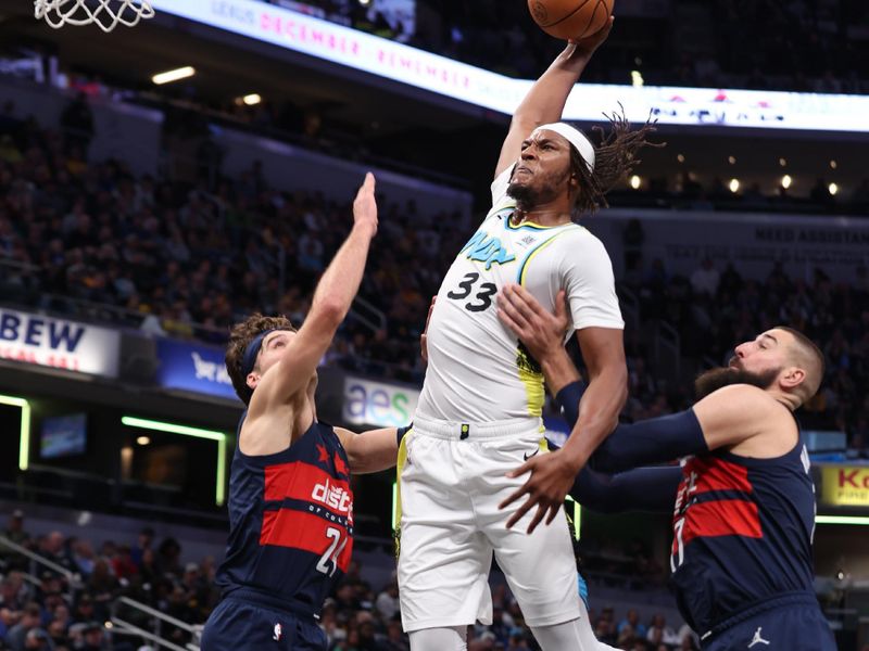 INDIANAPOLIS, IN - NOVEMBER 24: Myles Turner #33 of the Indiana Pacers dunks the ball during the game against the Washington Wizards on November 24, 2024 at Gainbridge Fieldhouse in Indianapolis, Indiana. NOTE TO USER: User expressly acknowledges and agrees that, by downloading and or using this Photograph, user is consenting to the terms and conditions of the Getty Images License Agreement. Mandatory Copyright Notice: Copyright 2024 NBAE (Photo by Pepper Robinson/NBAE via Getty Images)