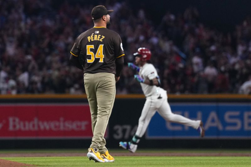 Sep 29, 2024; Phoenix, Arizona, USA; San Diego Padres pitcher Martín Pérez (54) reacts after allowing a two run home run to Arizona Diamondbacks second base Ketel Marte (4) during the fourth inning at Chase Field. Mandatory Credit: Joe Camporeale-Imagn Images