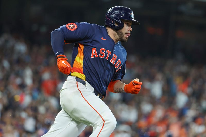 Apr 14, 2024; Houston, Texas, USA; Houston Astros catcher Victor Caratini (17) runs to first base on a double during the fourth inning against the Texas Rangers at Minute Maid Park. Mandatory Credit: Troy Taormina-USA TODAY Sports