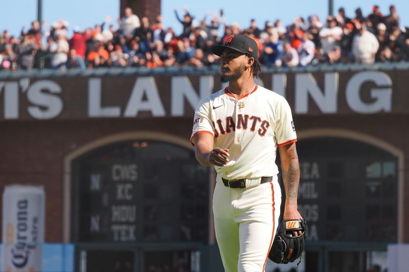 Apr 5, 2024; San Francisco, California, USA; San Francisco Giants relief pitcher Camilo Doval (75) returns to the dugout after the top of the ninth inning against the San Diego Padres at Oracle Park. Mandatory Credit: Kelley L Cox-USA TODAY Sports