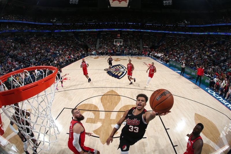 NEW ORLEANS, LA - MARCH 16: Toumani Camara #33 of the Portland Trail Blazers drives to the basket during the game against the New Orleans Pelicans on March 16, 2024 at the Smoothie King Center in New Orleans, Louisiana. NOTE TO USER: User expressly acknowledges and agrees that, by downloading and or using this Photograph, user is consenting to the terms and conditions of the Getty Images License Agreement. Mandatory Copyright Notice: Copyright 2024 NBAE (Photo by Layne Murdoch Jr./NBAE via Getty Images)