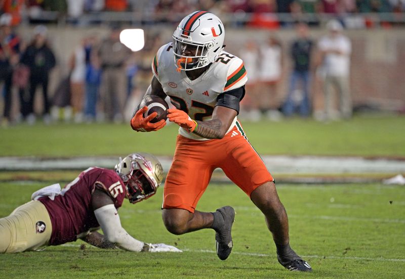 Nov 11, 2023; Tallahassee, Florida, USA; Miami Hurricanes running back Mark Fletcher Jr (22) runs the ball against the Florida State Seminoles during the second half at Doak S. Campbell Stadium. Mandatory Credit: Melina Myers-USA TODAY Sports