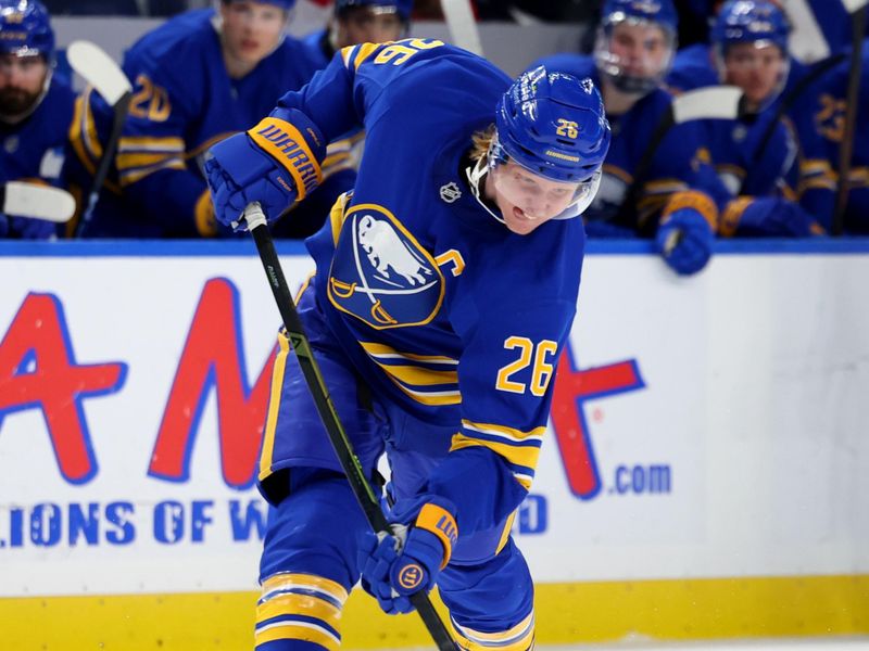 Oct 22, 2025; Buffalo, New York, USA;  Buffalo Sabres defenseman Rasmus Dahlin (26) takes a shot on goal during the second period against the Detroit Red Wings at KeyBank Center. Mandatory Credit: Timothy T. Ludwig-Imagn Images