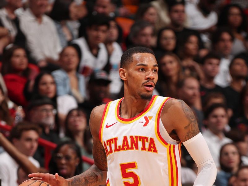 MIAMI, FL - JANUARY 19: Dejounte Murray #5 of the Atlanta Hawks looks on during the game against the Miami Heat on January 19, 2024 at Kaseya Center in Miami, Florida. NOTE TO USER: User expressly acknowledges and agrees that, by downloading and or using this Photograph, user is consenting to the terms and conditions of the Getty Images License Agreement. Mandatory Copyright Notice: Copyright 2024 NBAE (Photo by Issac Baldizon/NBAE via Getty Images)