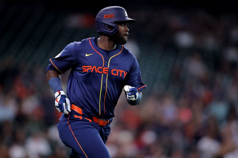 May 20, 2024; Houston, Texas, USA; Houston Astros designated hitter Yordan Alvarez (44) runs up the first base line after hitting a single against the Los Angeles Angels during the first inning at Minute Maid Park. Mandatory Credit: Erik Williams-USA TODAY Sports