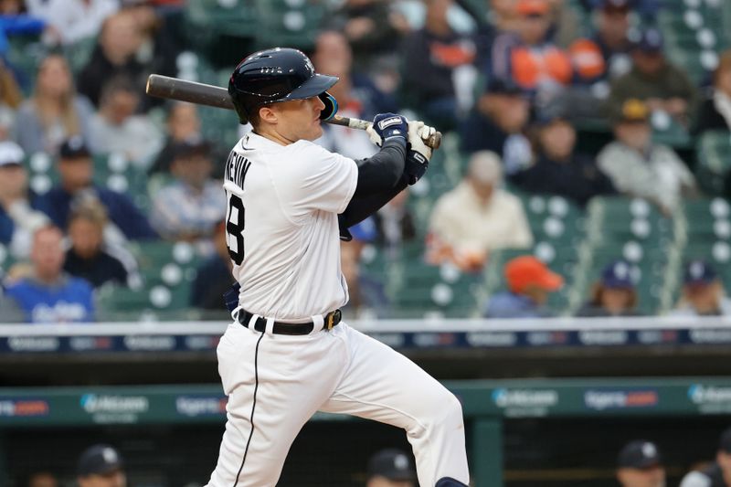 Sep 28, 2023; Detroit, Michigan, USA; Detroit Tigers third baseman Tyler Nevin (18) hits a triple in the seventh inning against the Kansas City Royals at Comerica Park. Mandatory Credit: Rick Osentoski-USA TODAY Sports