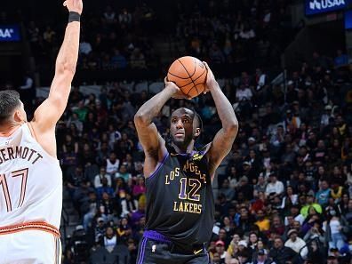 SAN ANTONIO, TX - DECEMBER 15: Taurean Prince #12 of the Los Angeles Lakers looks to pass the ball during the game against the San Antonio Spurs on December 15, 2023 at the Frost Bank Center in San Antonio, Texas. NOTE TO USER: User expressly acknowledges and agrees that, by downloading and or using this photograph, user is consenting to the terms and conditions of the Getty Images License Agreement. Mandatory Copyright Notice: Copyright 2023 NBAE (Photos by Michael Gonzales/NBAE via Getty Images)