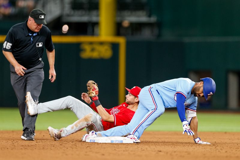 Apr 2, 2023; Arlington, Texas, USA; Texas Rangers second baseman Marcus Semien (2) is thrown out at 2nd against the Philadelphia Phillies at Globe Life Field. Mandatory Credit: Andrew Dieb-USA TODAY Sports