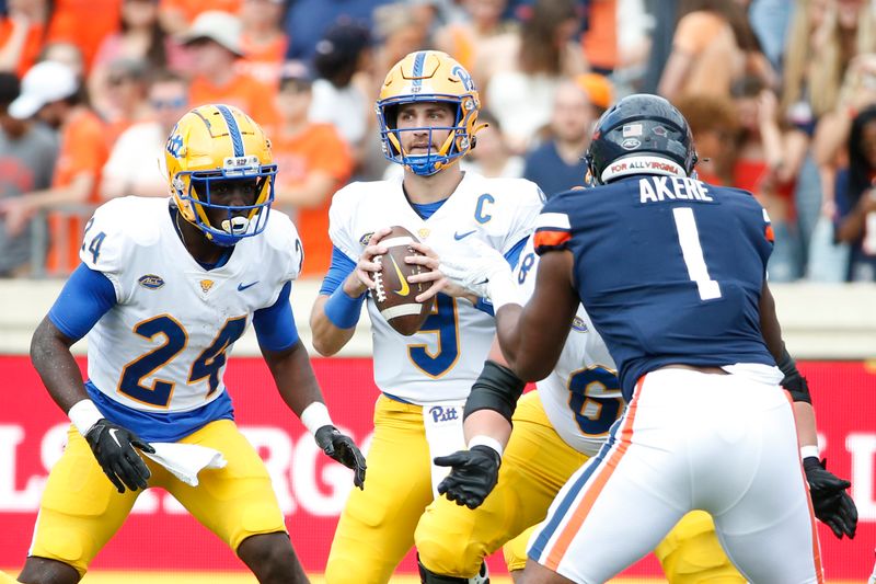 Nov 12, 2022; Charlottesville, Virginia, USA; Pittsburgh Panthers quarterback Kedon Slovis (9) prepares to throw the ball against the Virginia Cavaliers during the first half at Scott Stadium. Mandatory Credit: Amber Searls-USA TODAY Sports