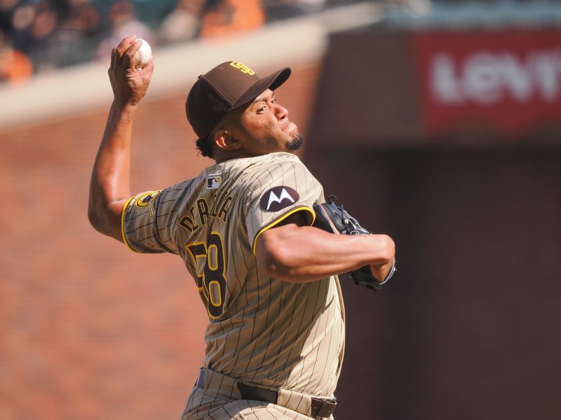 Apr 5, 2024; San Francisco, California, USA; San Diego Padres relief pitcher Wandy Peralta (58) pitches the ball against the San Francisco Giants during the eighth inning at Oracle Park. Mandatory Credit: Kelley L Cox-USA TODAY Sports