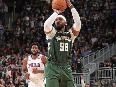 MILWAUKEE, WI - OCTOBER 26: Jae Crowder #99 of the Milwaukee Bucks shoots a three point basket during the game against the Philadelphia 76ers on October 26, 2023 at the Fiserv Forum Center in Milwaukee, Wisconsin. NOTE TO USER: User expressly acknowledges and agrees that, by downloading and or using this Photograph, user is consenting to the terms and conditions of the Getty Images License Agreement. Mandatory Copyright Notice: Copyright 2023 NBAE (Photo by Gary Dineen/NBAE via Getty Images).