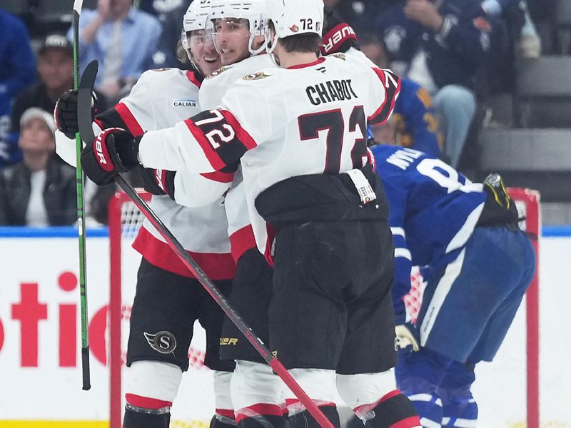 Apr 29, 2025; Toronto, Ontario, CAN; Ottawa Senators center Dylan Cozens (24) celebrates with defenseman Thomas Chabot (72) after scoring against the Toronto Maple Leafs in the third period during game five of the first round of the 2025 Stanley Cup Playoffs at Scotiabank Arena. Mandatory Credit: Nick Turchiaro-Imagn Images