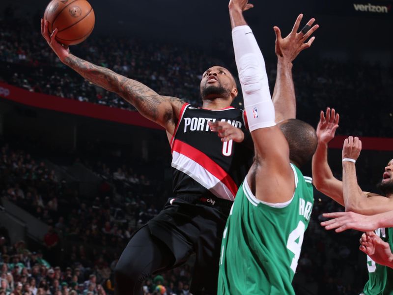 PORTLAND, OR - MARCH 17: Damian Lillard #0 of the Portland Trail Blazers drives to the basket against the Boston Celtics on March 17, 2023 at the Moda Center Arena in Portland, Oregon. NOTE TO USER: User expressly acknowledges and agrees that, by downloading and or using this photograph, user is consenting to the terms and conditions of the Getty Images License Agreement. Mandatory Copyright Notice: Copyright 2023 NBAE (Photo by Sam Forencich/NBAE via Getty Images)