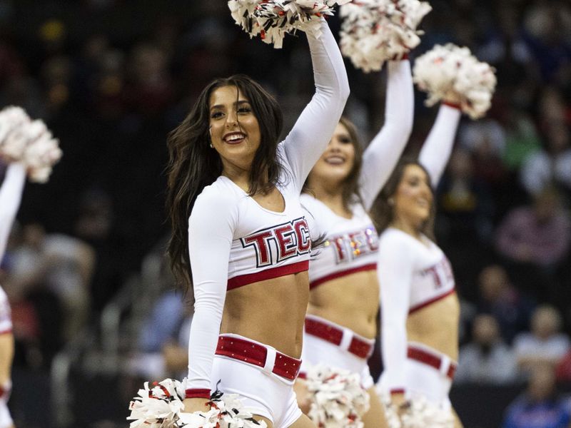 Mar 8, 2023; Kansas City, MO, USA; Texas Tech Red Raiders cheerleaders perform in the first half against the West Virginia Mountaineers at T-Mobile Center. Mandatory Credit: Amy Kontras-USA TODAY Sports