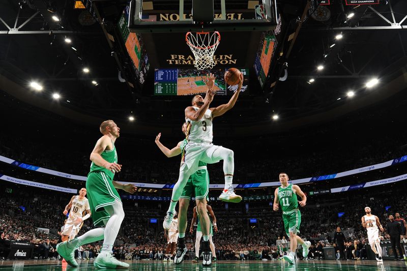 BOSTON, MA - JANUARY 12: CJ McCollum #3 of the New Orleans Pelicans drives to the basket during the game against the Boston Celtics on January 12, 2025 at TD Garden in Boston, Massachusetts. NOTE TO USER: User expressly acknowledges and agrees that, by downloading and/or using this Photograph, user is consenting to the terms and conditions of the Getty Images License Agreement. Mandatory Copyright Notice: Copyright 2025 NBAE (Photo by Brian Babineau/NBAE via Getty Images)