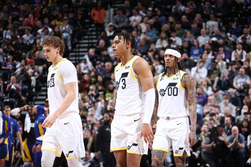 SALT LAKE CITY, UT - FEBRUARY 15: Lauri Markkanen #23, Keyonte George #3 and Jordan Clarkson #00 of the Utah Jazz walk towards the bench during the game against the Golden State Warriors on February 15, 2024 at Delta Center in Salt Lake City, Utah. NOTE TO USER: User expressly acknowledges and agrees that, by downloading and or using this Photograph, User is consenting to the terms and conditions of the Getty Images License Agreement. Mandatory Copyright Notice: Copyright 2024 NBAE (Photo by Melissa Majchrzak/NBAE via Getty Images)