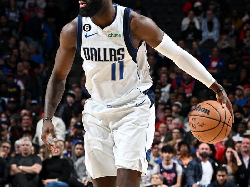 PHILADELPHIA, PA - MARCH 29: Tim Hardaway Jr. #11 of the Dallas Mavericks dribbles the ball during the game against the Philadelphia 76ers on March 29, 2023 at the Wells Fargo Center in Philadelphia, Pennsylvania NOTE TO USER: User expressly acknowledges and agrees that, by downloading and/or using this Photograph, user is consenting to the terms and conditions of the Getty Images License Agreement. Mandatory Copyright Notice: Copyright 2023 NBAE (Photo by David Dow/NBAE via Getty Images)