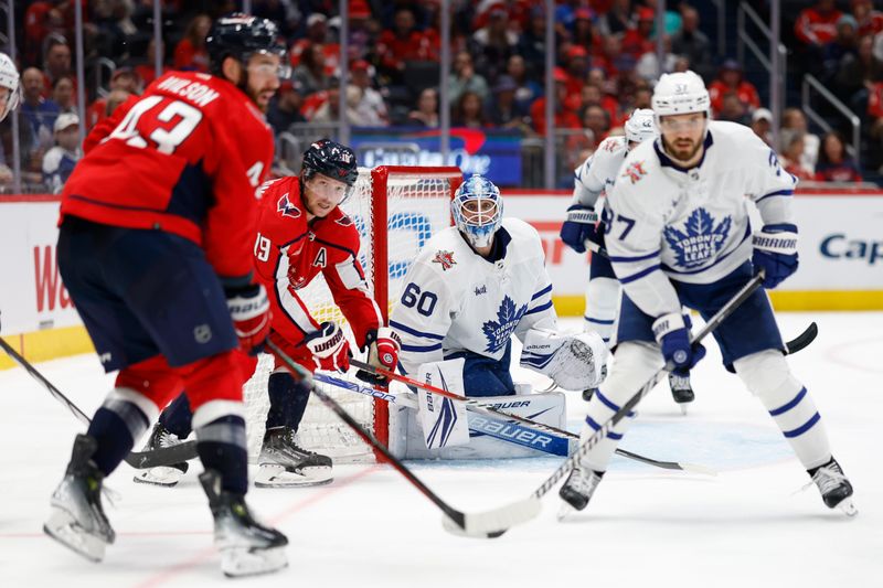 Oct 24, 2023; Washington, District of Columbia, USA; Toronto Maple Leafs goaltender Joseph Woll (60) follows the puck against the Washington Capitals in the third period at Capital One Arena. Mandatory Credit: Geoff Burke-USA TODAY Sports