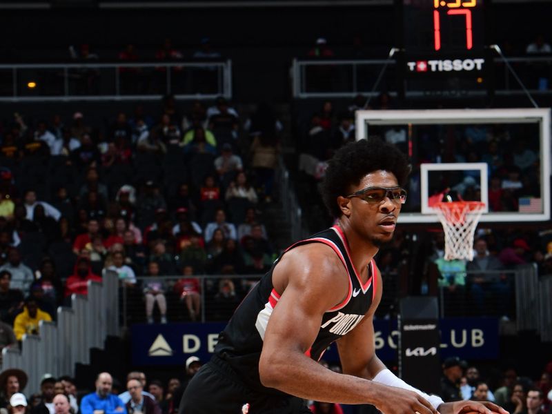 ATLANTA, GA - MARCH 27: Scoot Henderson #00 of the Portland Trail Blazers dribbles the ball during the game against the Atlanta Hawks on March 27, 2024 at State Farm Arena in Atlanta, Georgia.  NOTE TO USER: User expressly acknowledges and agrees that, by downloading and/or using this Photograph, user is consenting to the terms and conditions of the Getty Images License Agreement. Mandatory Copyright Notice: Copyright 2024 NBAE (Photo by Scott Cunningham/NBAE via Getty Images)