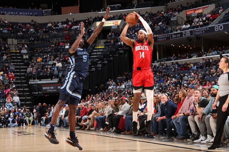 MEMPHIS, TN - FEBRUARY 14: Nate Hinton #14 of the Houston Rockets shoots a three point basket against the Memphis Grizzlies on February 14, 2024 at FedExForum in Memphis, Tennessee. NOTE TO USER: User expressly acknowledges and agrees that, by downloading and or using this photograph, User is consenting to the terms and conditions of the Getty Images License Agreement. Mandatory Copyright Notice: Copyright 2024 NBAE (Photo by Joe Murphy/NBAE via Getty Images)