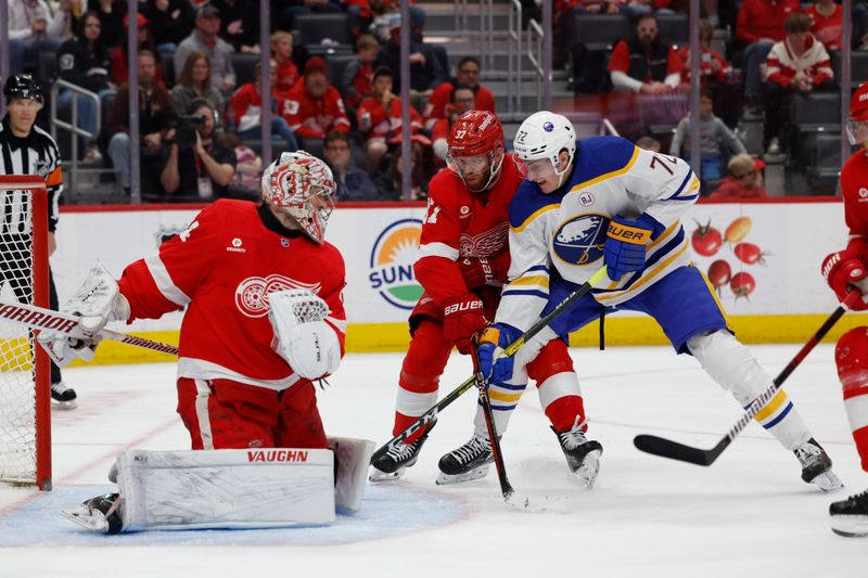 Apr 7, 2024; Detroit, Michigan, USA; Detroit Red Wings left wing J.T. Compher (37) and Buffalo Sabres right wing Tage Thompson (72) fight for position in front of goaltender Alex Lyon (34) in the third period at Little Caesars Arena. Mandatory Credit: Rick Osentoski-USA TODAY Sports