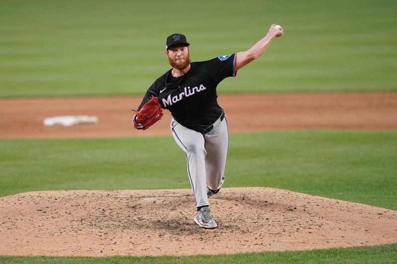 Jun 14, 2024; Washington, District of Columbia, USA; Miami Marlins relief pitcher A.J. Puk (35) throws the ball in the seventh inning against the Washington Nationals at Nationals Park. Mandatory Credit: Amber Searls-USA TODAY Sports