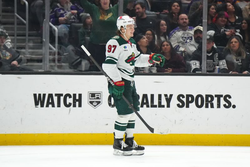 Apr 15, 2024; Los Angeles, California, USA; Minnesota Wild left wing Kirill Kaprizov (97) celebrates after scoring a goal against the LA Kings in the third period at Crypto.com Arena. Mandatory Credit: Kirby Lee-USA TODAY Sports