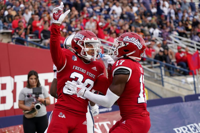 Oct 23, 2021; Fresno, California, USA; Fresno State Bulldogs defensive back Bralyn Lux (38) celebrates after breaking up a pass against the Nevada Wolf Pack in the first quarter at Bulldog Stadium. Mandatory Credit: Cary Edmondson-USA TODAY Sports