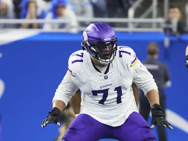 Minnesota Vikings offensive tackle Christian Darrisaw (71) blocks against the Detroit Lions during an NFL football game at Ford Field in Detroit, Sunday, Jan. 7, 2024. (AP Photo/Rick Osentoski)