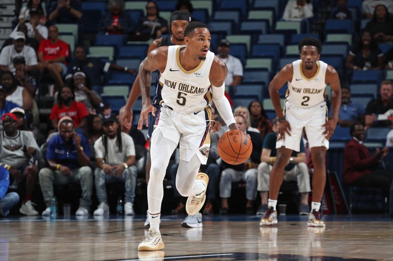 NEW ORLEANS, LA - OCTOBER 7: Dejounte Murray #5 of the New Orleans Pelicans dribbles the ball during the game against the Orlando Magic on October 7, 2024 at the Smoothie King Center in New Orleans, Louisiana. NOTE TO USER: User expressly acknowledges and agrees that, by downloading and or using this Photograph, user is consenting to the terms and conditions of the Getty Images License Agreement. Mandatory Copyright Notice: Copyright 2024 NBAE (Photo by Layne Murdoch Jr./NBAE via Getty Images)